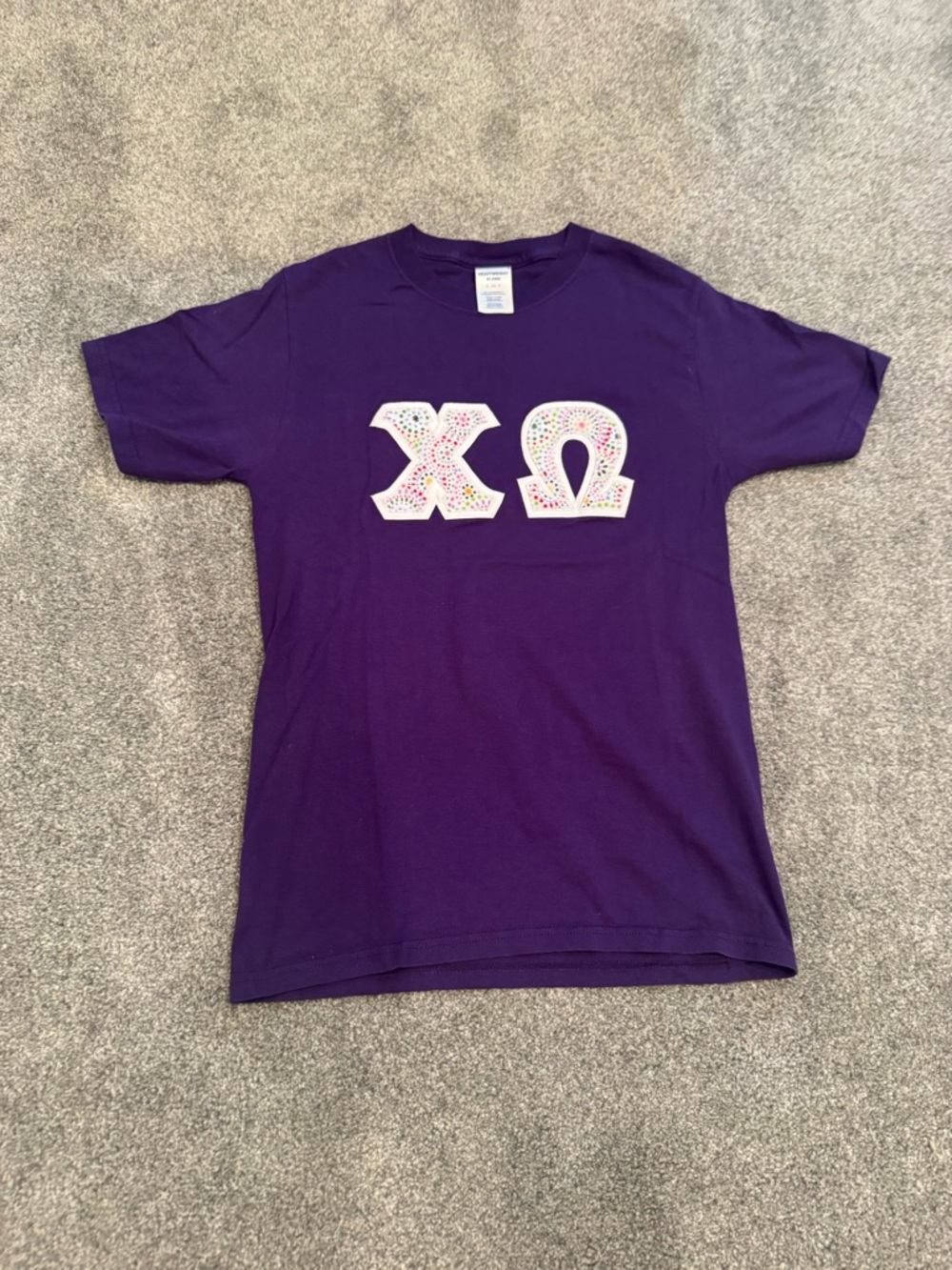 Purple multicolored dot chi omega letters